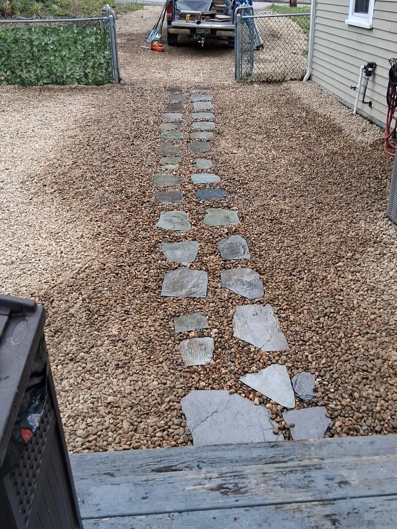 Stone pathway installation and exterior repair by 24-7 Handyman LLC in Hillsborough County NH